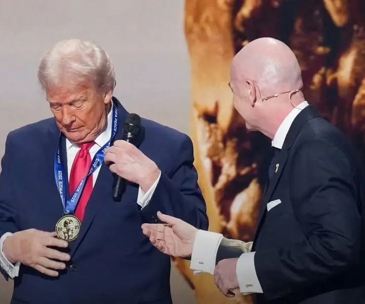 President Trump and FIFA president during the peace prize award